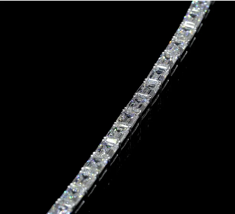 5.47 Cts 14k White Gold Emerald Shape Tennis Bracelet - Image 4