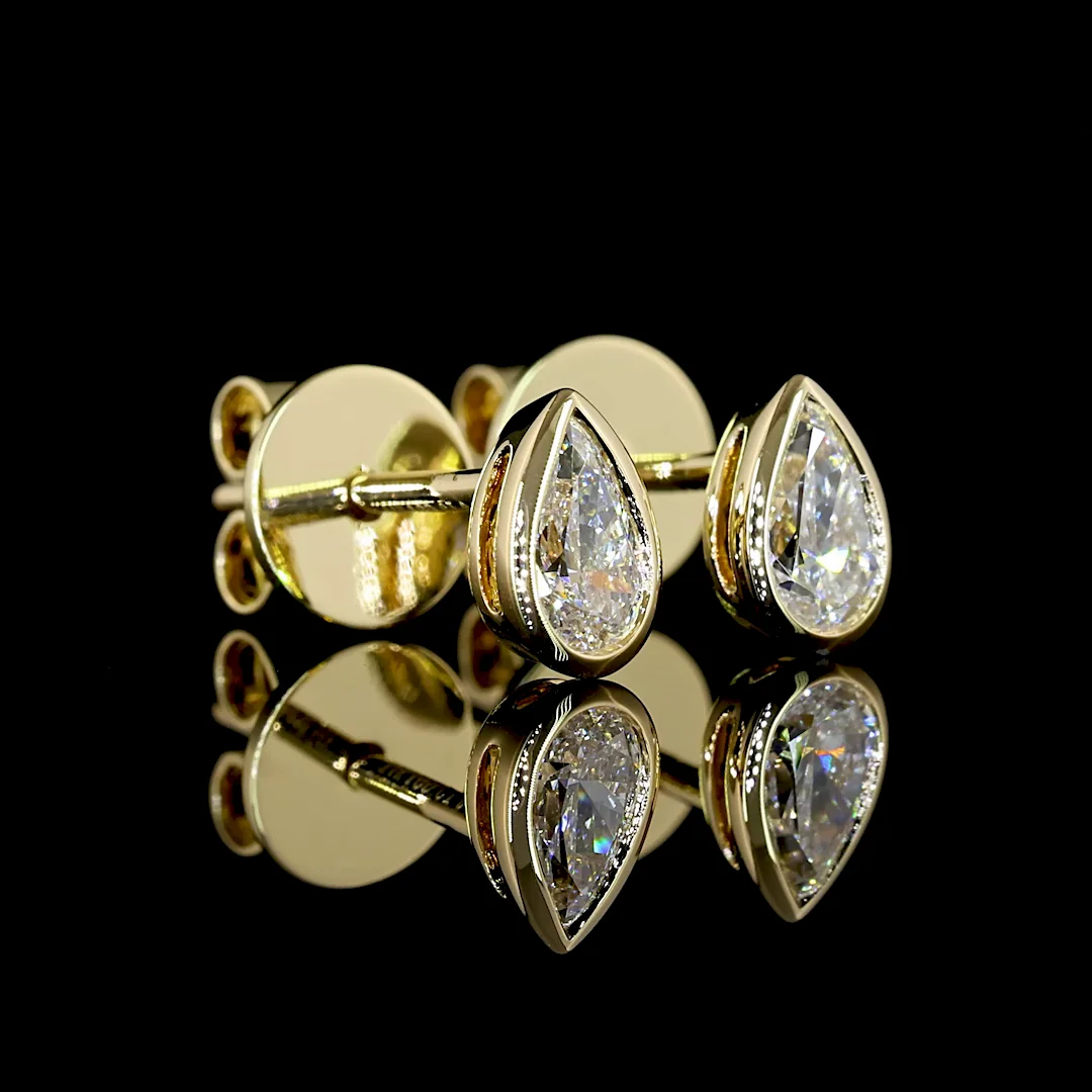 0.33 Cts 14k Yellow Gold Pear Shape Studs Earring