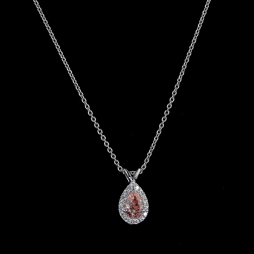 0.62 Cts 14k White Gold Pear Shape Halo Pendant
