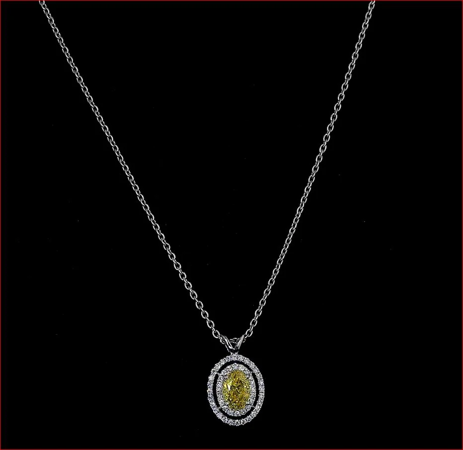 0.68 Cts 14k White Gold Oval Shape Double Halo Pendant